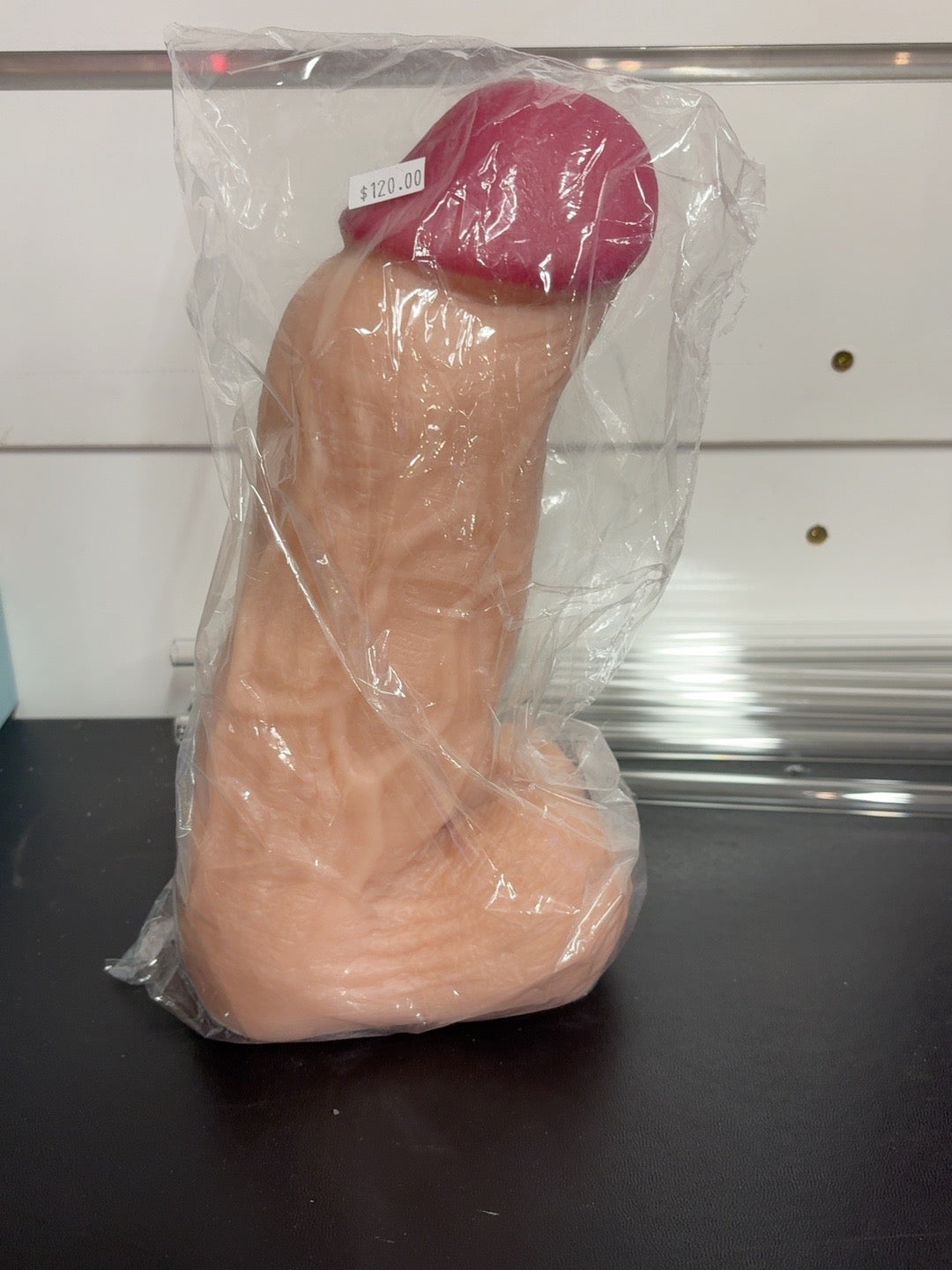 Giant realistic flesh-tone dildo